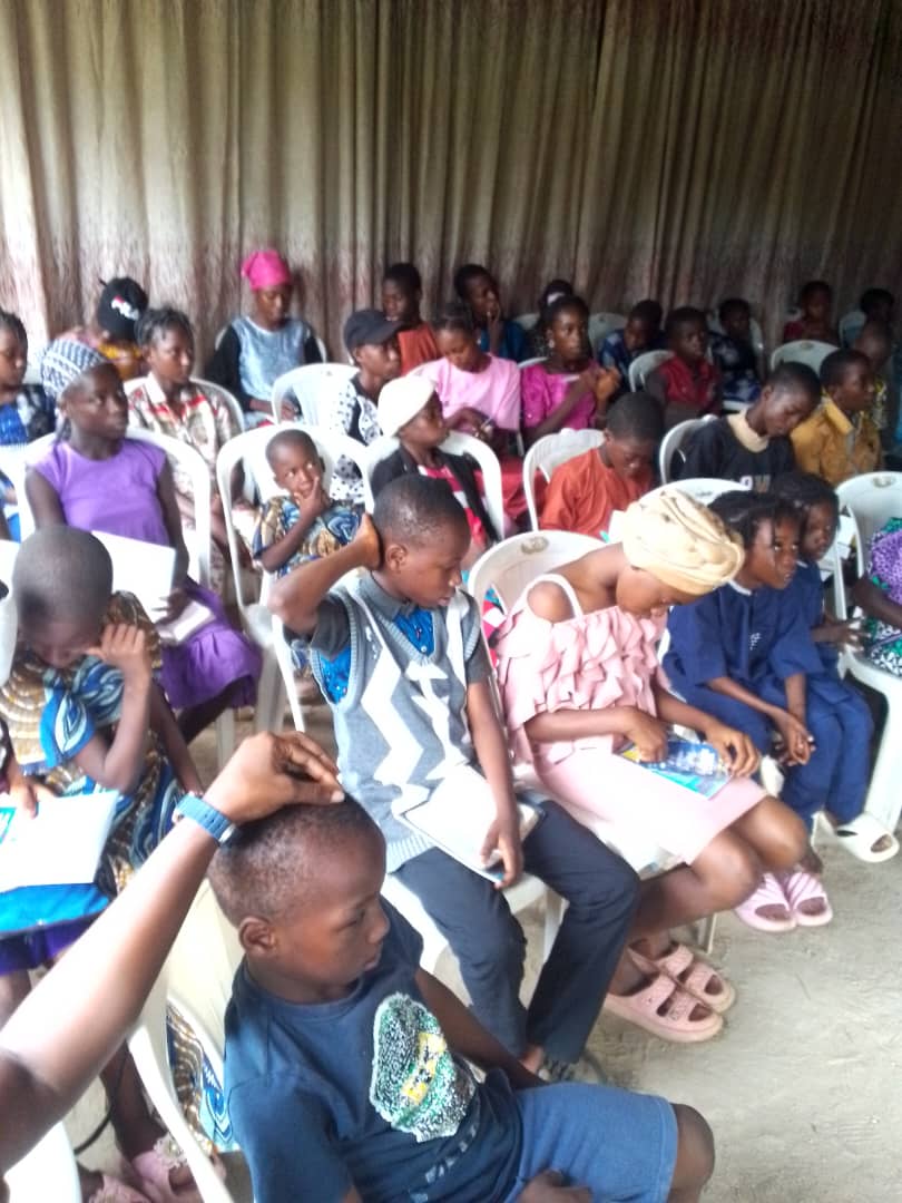 Prayer time with the children and teens